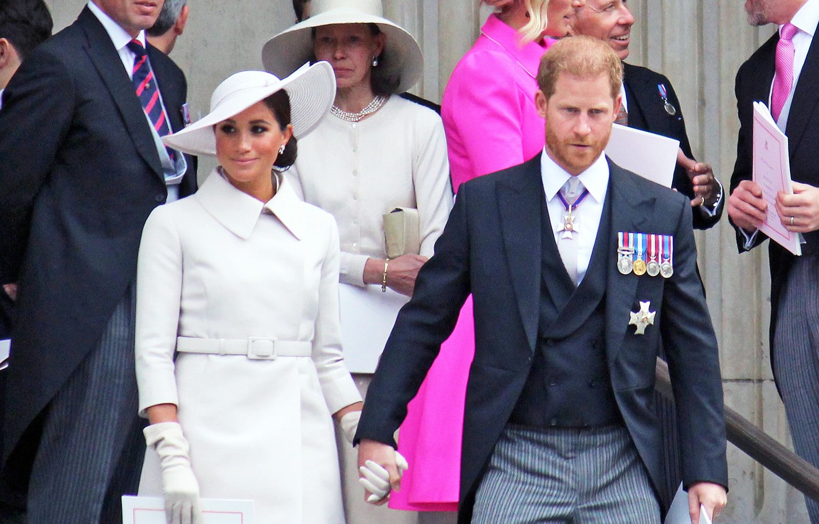 London, UK - 06.03.2022: Meghan Markle Prince Harry attend Platinum Jubilee thanks giving service at St Pauls Cathedral, Meghan wearing white coat dress, London UK — Photo by cheekylorns2