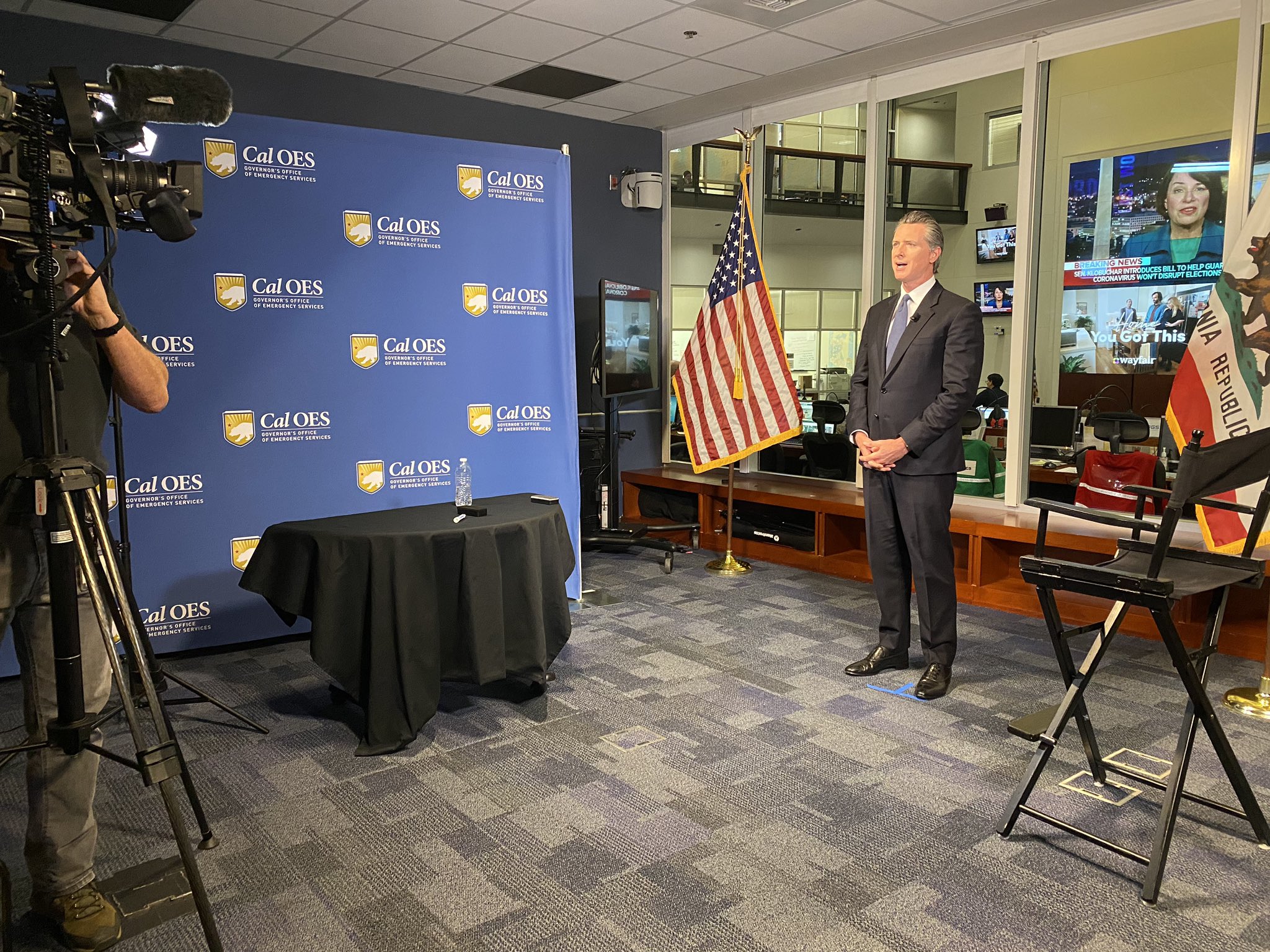 Gavin Newsom hosting a press conference 3.16.20
