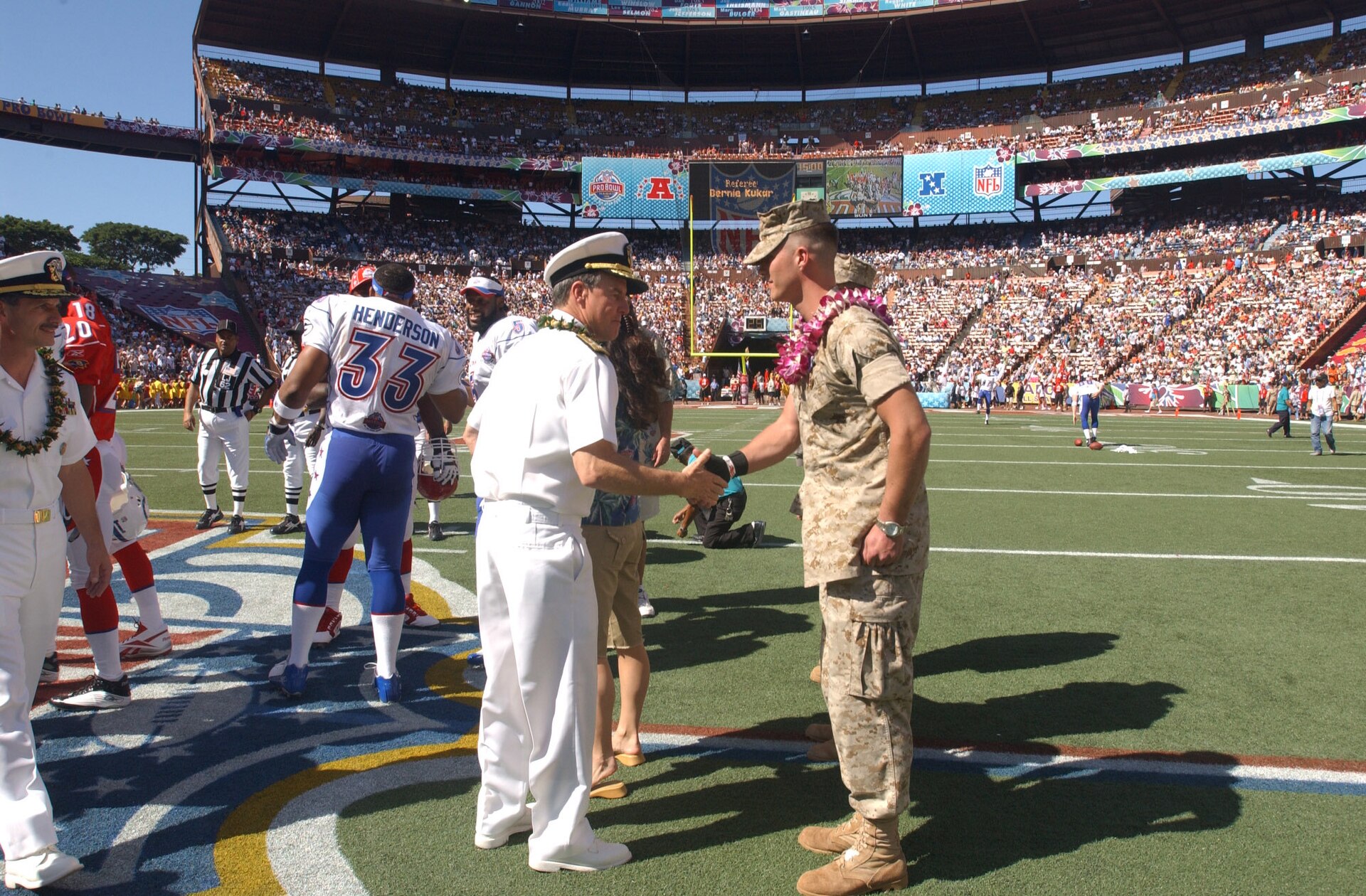 US Navy 050213 N 9076B 043 Commander, U.S. Pacific Command, Adm. Thomas Fargo shakes the hand of a Purple Heart recipient prior to the kickoff of the 2005 NFL Pro Bowl in Honolulu, Hawaii