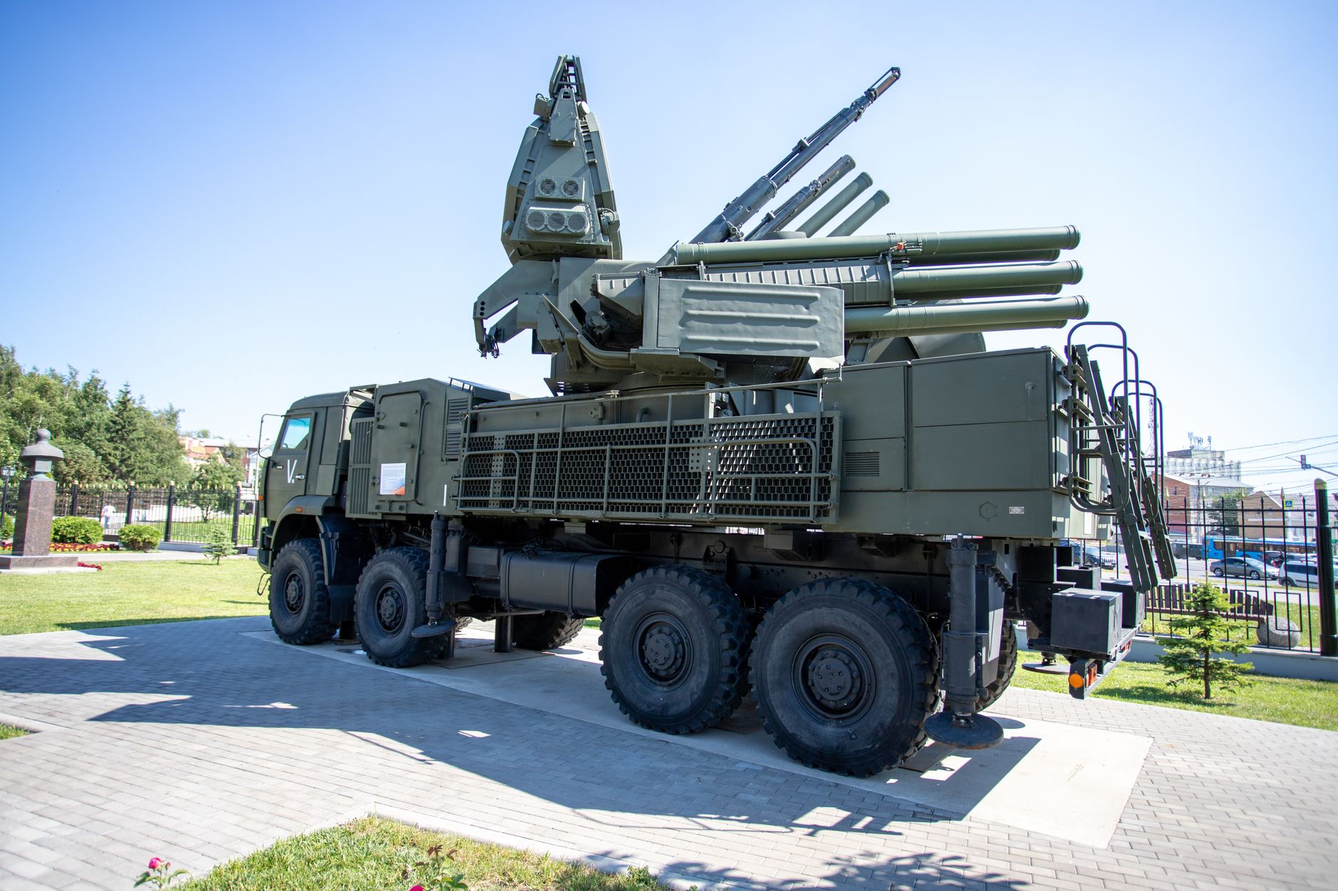 Outdoor display of a military missile defense system on a sunny day, highlighting its structure.