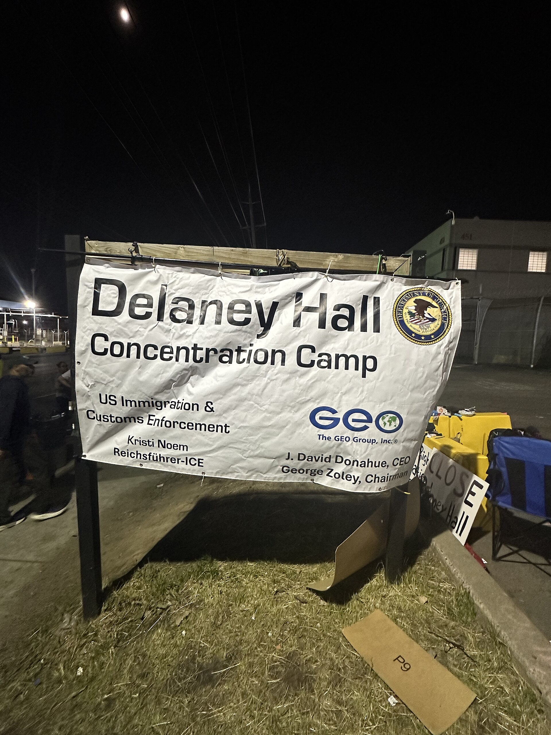 "Delaney Hall Concentration Camp" banner