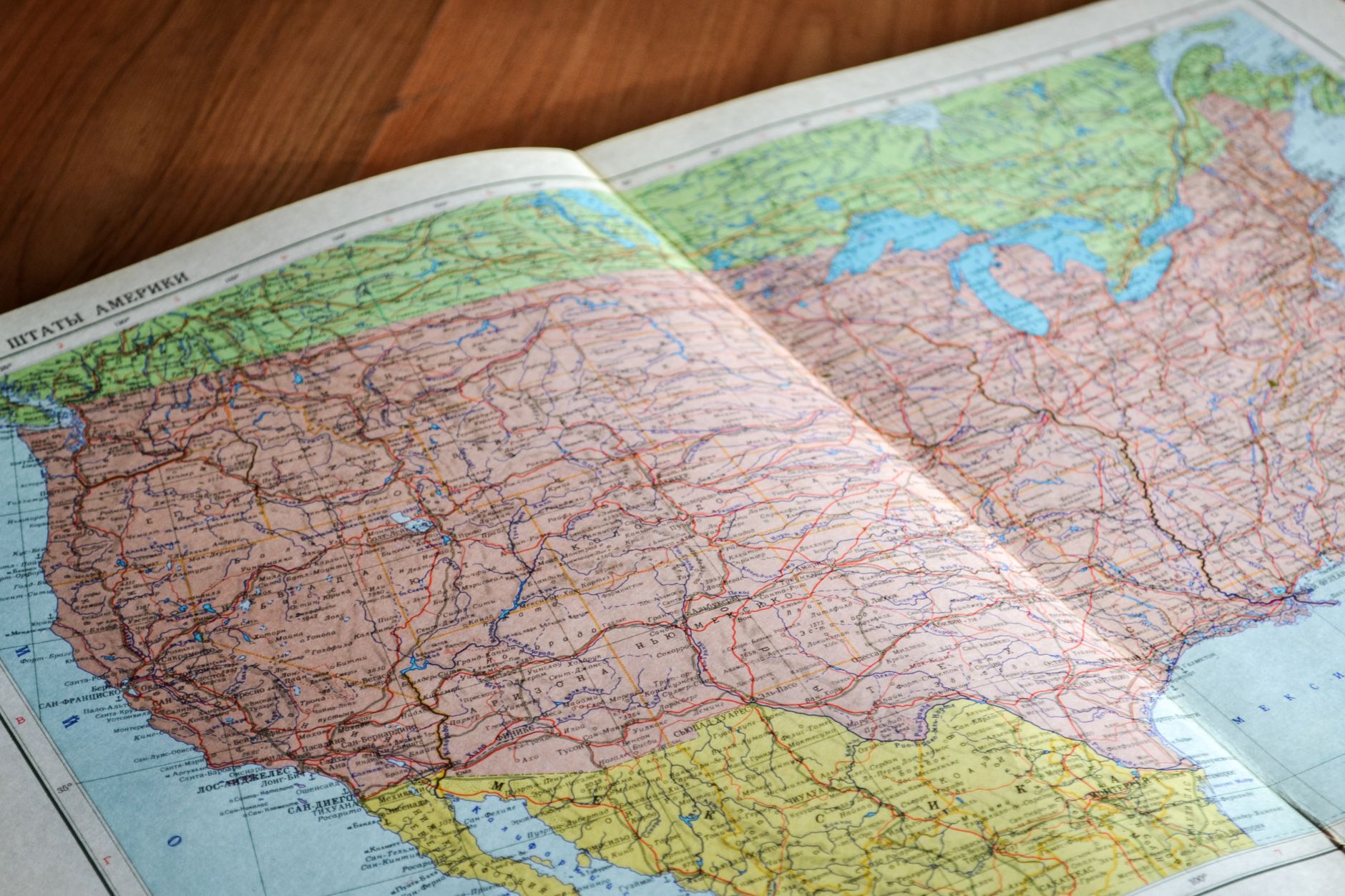 High angle view of a vintage map depicting the United States with intricate details.