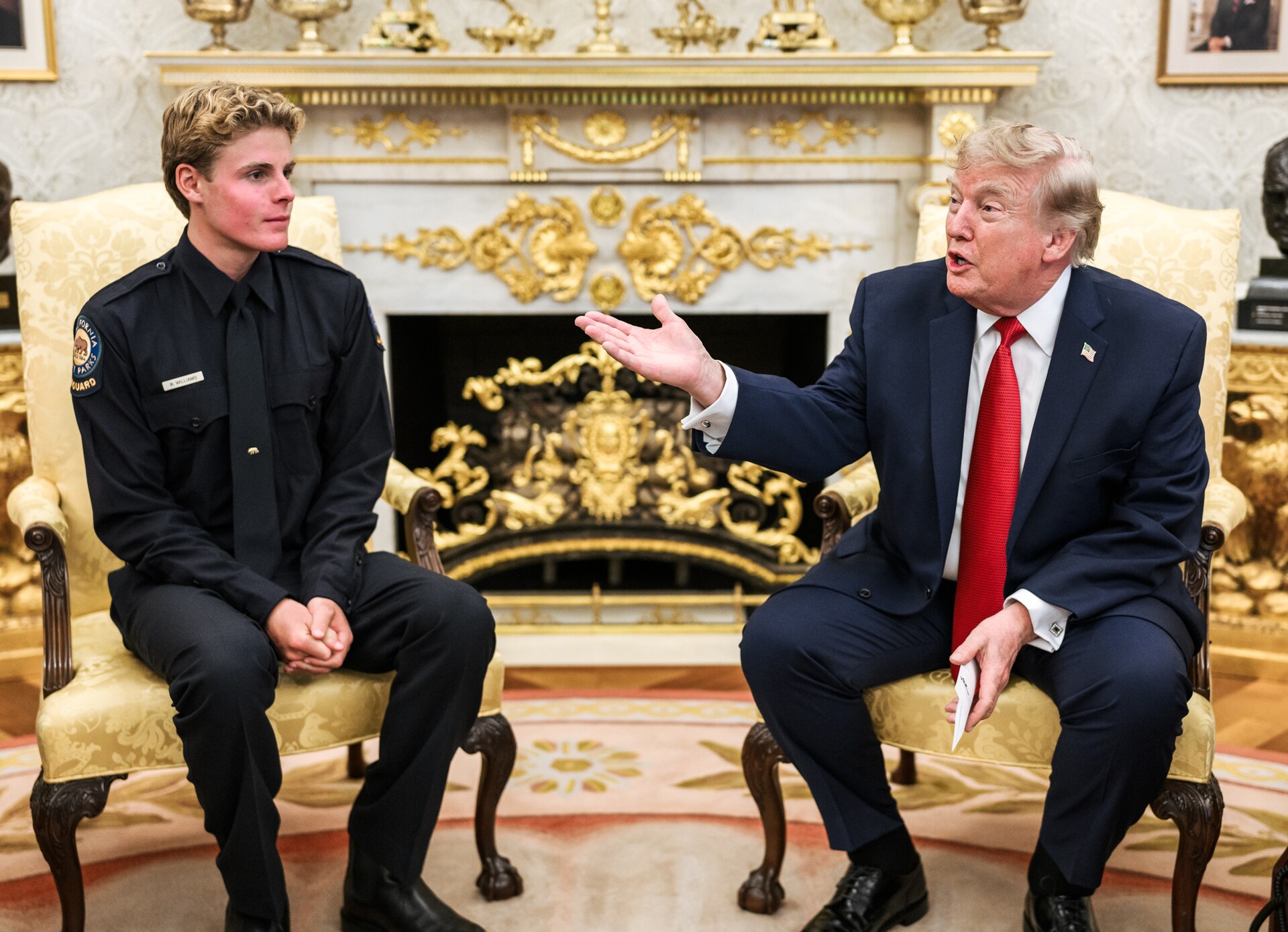 P20260817DT 0319 President Donald J. Trump meets with hero lifeguard Ryder Williams, and Nathaniel Rai (cropped)