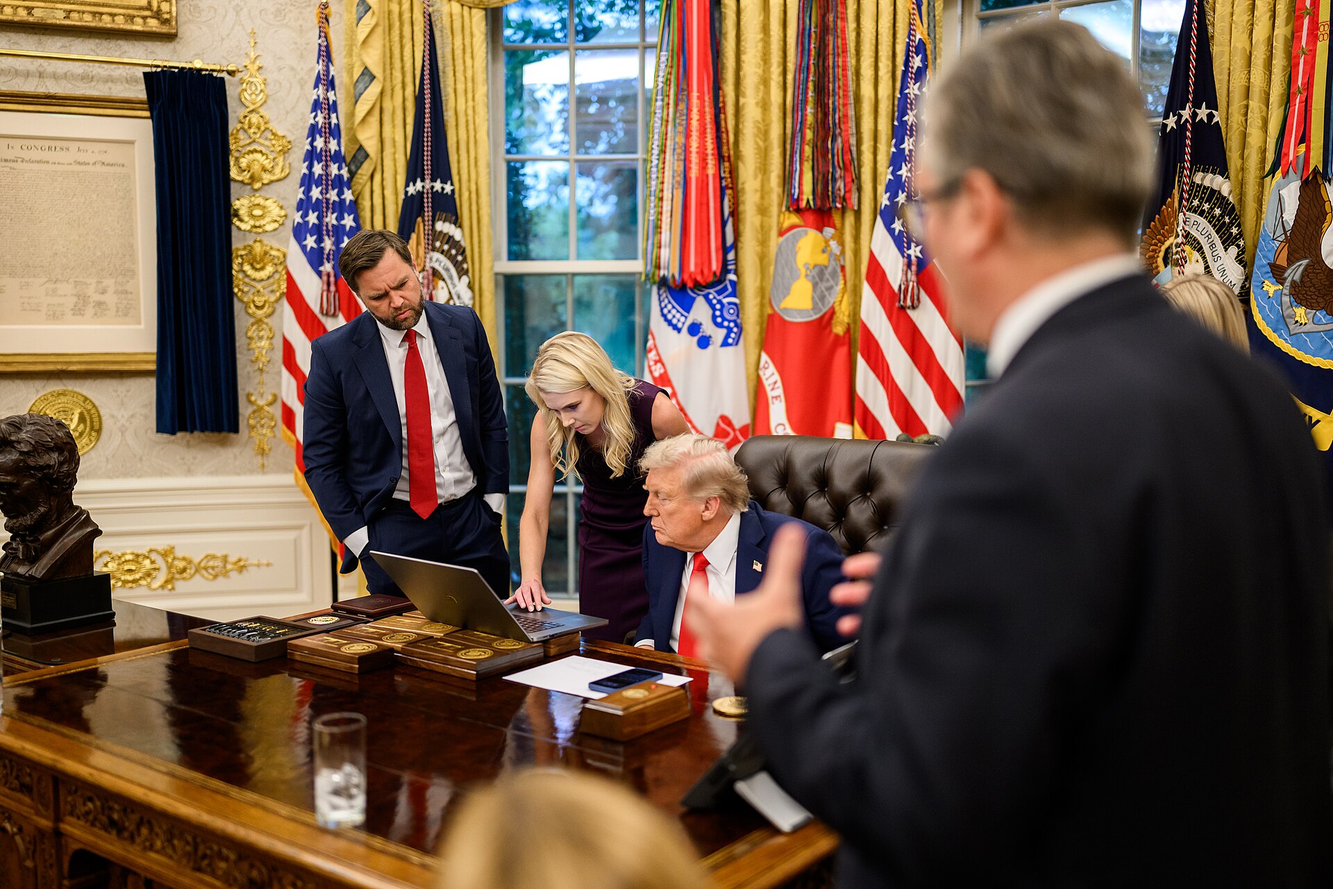 President Donald Trump drafts a Truth Social post alongside Vice President JD Vance and Assistant to the President Natalie Harp during a meeting with European leaders (54732035399)
