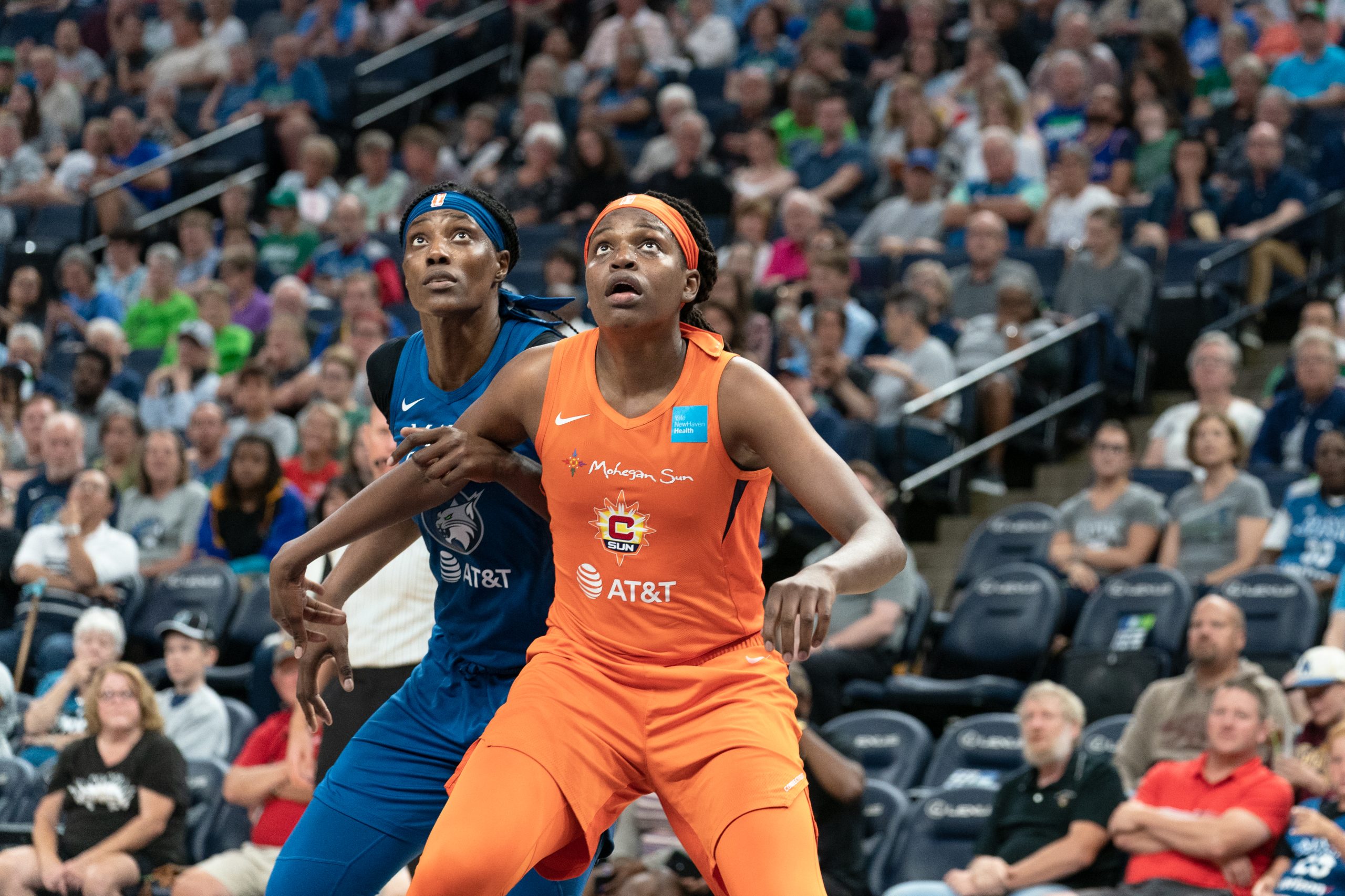 Sylvia Fowles and Jonquel Jones look for a rebound