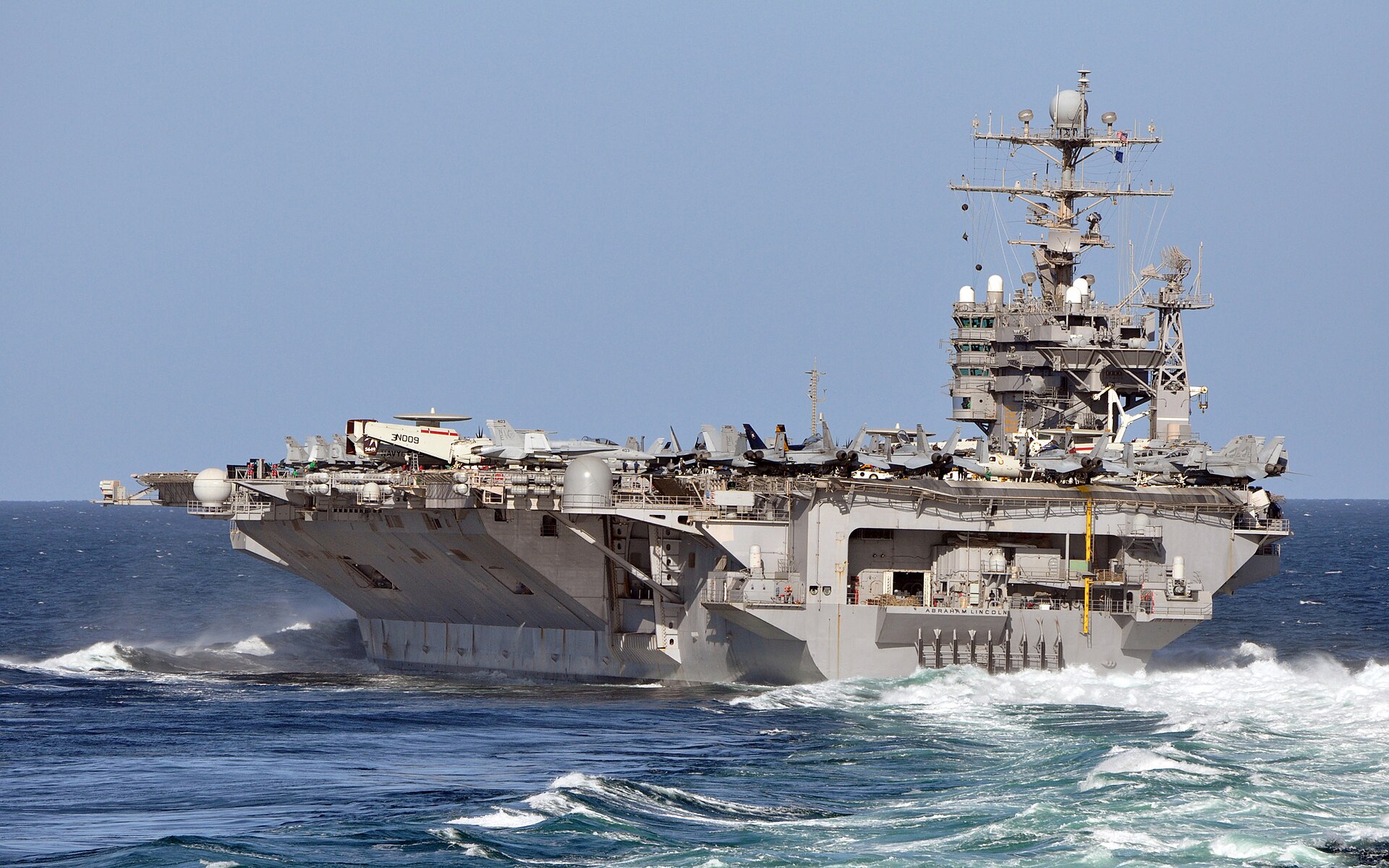 US Navy 110127 N 8369A 014 The aircraft carrier USS Abraham Lincoln (CVN 72) maneuvers through a turn